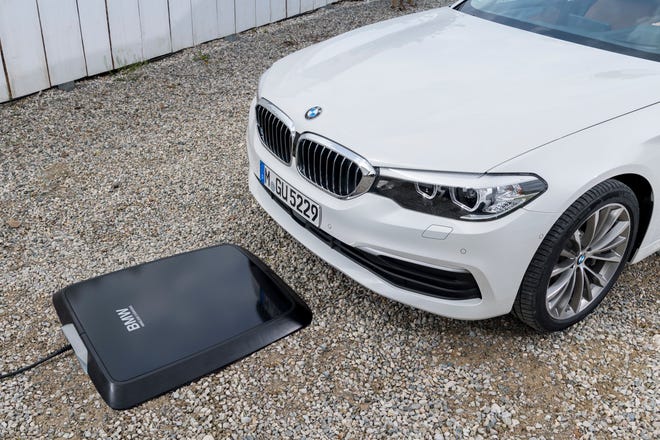 dfd6447e8cc3-BMW_wireless_EV_charging_-_credit_BMW.jpg